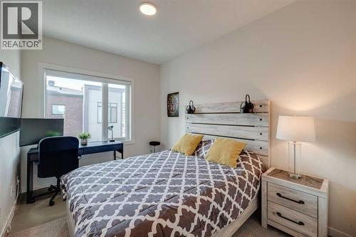 Upper level 2nd bedroom - 614 Greenbriar Common Nw, Calgary, AB - Indoor Photo Showing Bedroom
