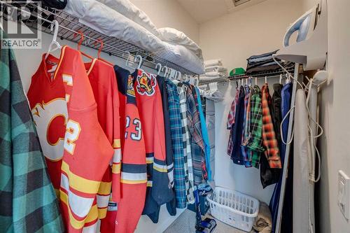 Primary walk in closet - 614 Greenbriar Common Nw, Calgary, AB - Indoor With Storage