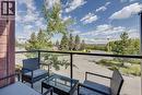 Patio/deck off the living area - 614 Greenbriar Common Nw, Calgary, AB  - Outdoor With View 