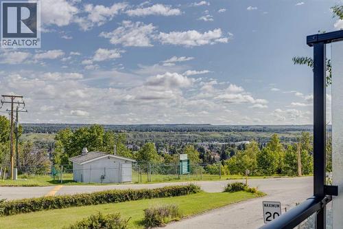 View from the living room deck - 614 Greenbriar Common Nw, Calgary, AB - Outdoor With View