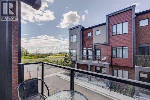 Patio off the kitchen - 614 Greenbriar Common Nw, Calgary, AB - Outdoor With Exterior