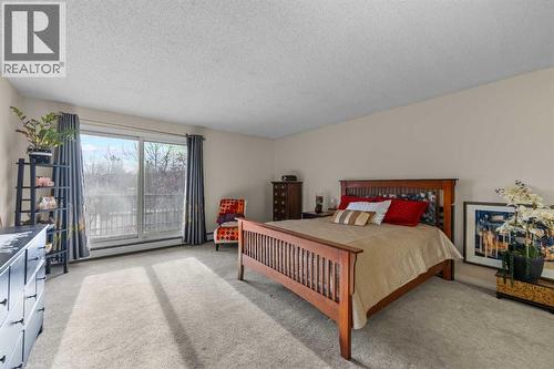 Oversized Primary - 301, 305 25 Avenue Sw, Calgary, AB - Indoor Photo Showing Bedroom