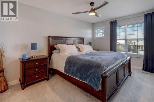 703, 115 Sagewood Drive Sw, Airdrie, AB - Indoor Photo Showing Bedroom