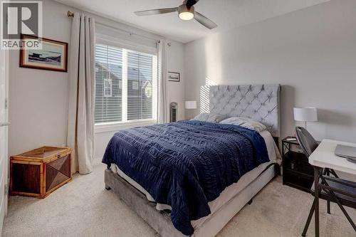 703, 115 Sagewood Drive Sw, Airdrie, AB - Indoor Photo Showing Bedroom