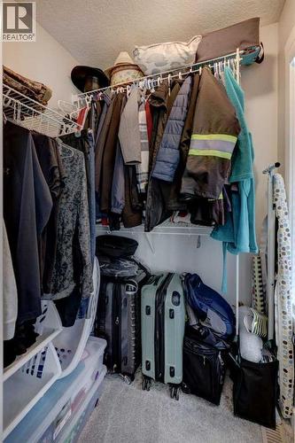 703, 115 Sagewood Drive Sw, Airdrie, AB - Indoor With Storage