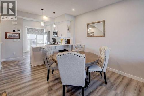 703, 115 Sagewood Drive Sw, Airdrie, AB - Indoor Photo Showing Dining Room