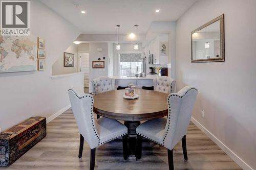 703, 115 Sagewood Drive Sw, Airdrie, AB - Indoor Photo Showing Dining Room