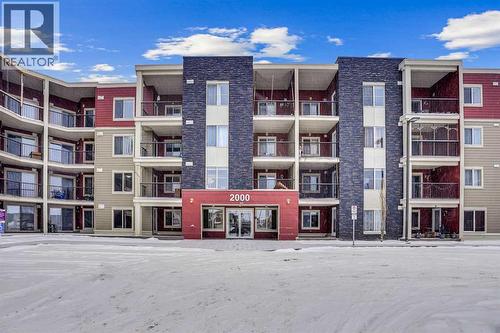 411, 15 Saddlestone Way Ne, Calgary, AB - Outdoor With Balcony With Facade