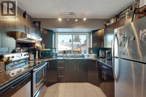 312 Pinegreen Close Ne, Calgary, AB - Indoor Photo Showing Kitchen With Stainless Steel Kitchen