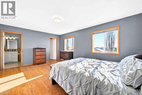 30 Tuscarora Way Nw, Calgary, AB - Indoor Photo Showing Bedroom