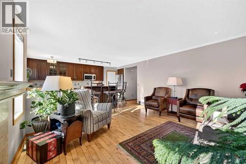30 Tuscarora Way Nw, Calgary, AB - Indoor Photo Showing Living Room