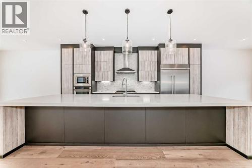 923 36A Street Nw, Calgary, AB - Indoor Photo Showing Kitchen With Upgraded Kitchen