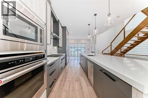 923 36A Street Nw, Calgary, AB - Indoor Photo Showing Kitchen With Upgraded Kitchen