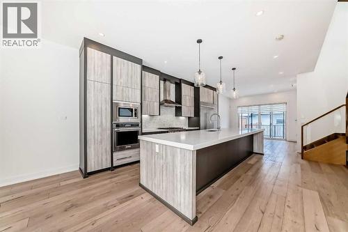 923 36A Street Nw, Calgary, AB - Indoor Photo Showing Kitchen With Upgraded Kitchen