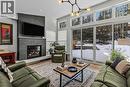 283C Three Sisters Drive, Canmore, AB  - Indoor Photo Showing Living Room With Fireplace 