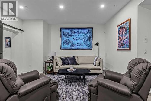 283C Three Sisters Drive, Canmore, AB - Indoor Photo Showing Living Room