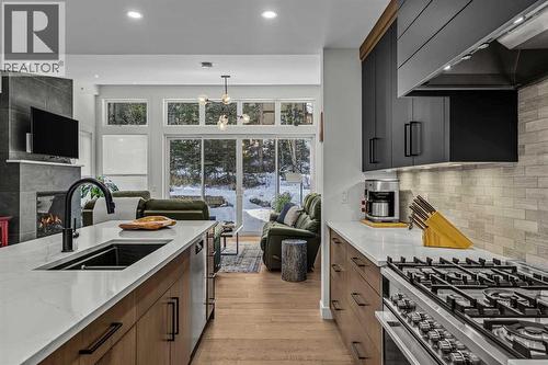 283C Three Sisters Drive, Canmore, AB - Indoor Photo Showing Kitchen With Double Sink With Upgraded Kitchen