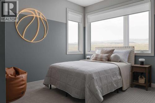 147 Siltstone Place, Balzac, AB - Indoor Photo Showing Bedroom