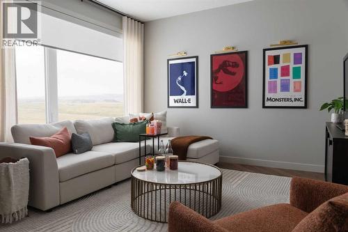 147 Siltstone Place, Balzac, AB - Indoor Photo Showing Living Room