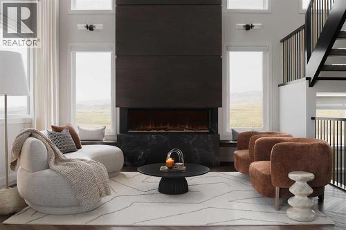 147 Siltstone Place, Balzac, AB - Indoor Photo Showing Living Room With Fireplace