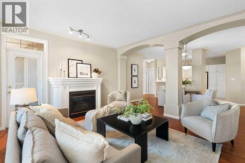 404, 2422 Erlton Street Sw, Calgary, AB - Indoor Photo Showing Living Room With Fireplace