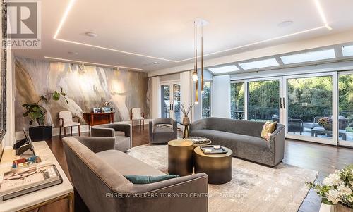 Featuring skylights and walkouts to the large deck - 1 Bryce Avenue, Toronto, ON - Indoor Photo Showing Living Room