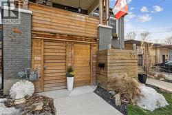 View of outdoor structure featuring a gate - 