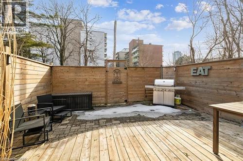 Wooden deck featuring a fenced backyard, a patio area, and grilling area - 28 Grove Street, Hamilton, ON - Outdoor With Deck Patio Veranda