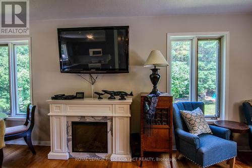 5144 25Th Siderd, Essa, ON - Indoor Photo Showing Living Room With Fireplace