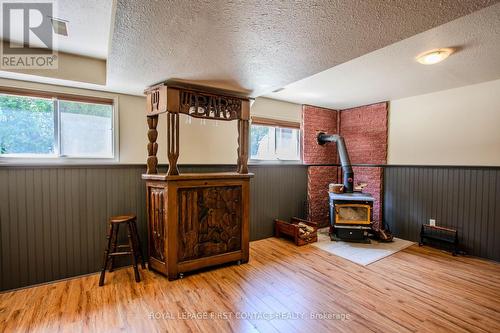 5144 25Th Siderd, Essa, ON - Indoor Photo Showing Other Room With Fireplace
