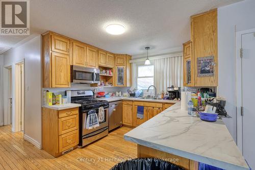 719 Peel Street, Woodstock (Woodstock - South), ON - Indoor Photo Showing Kitchen With Double Sink
