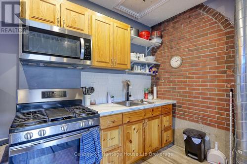 719 Peel Street, Woodstock (Woodstock - South), ON - Indoor Photo Showing Kitchen With Double Sink
