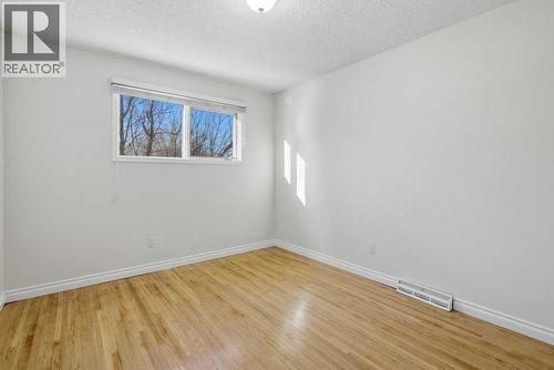 3703 Valdes Place Nw, Calgary, AB - Indoor Photo Showing Other Room