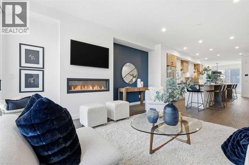 2104 17A Street Sw, Calgary, AB - Indoor Photo Showing Living Room With Fireplace