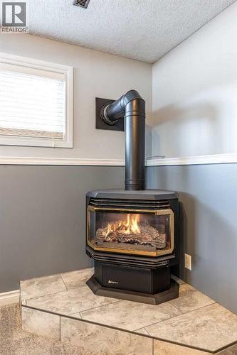 52 Ross Haven Way Se, Medicine Hat, AB - Indoor With Fireplace