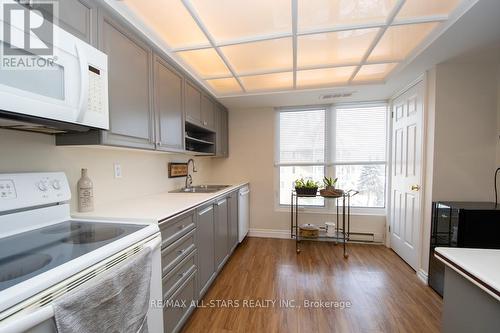 408 - 50 Rivermill Boulevard, Kawartha Lakes (Lindsay), ON - Indoor Photo Showing Kitchen With Double Sink