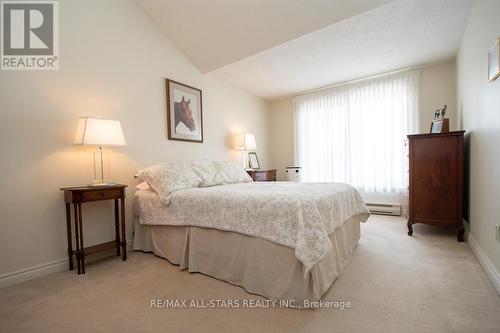 408 - 50 Rivermill Boulevard, Kawartha Lakes (Lindsay), ON - Indoor Photo Showing Bedroom