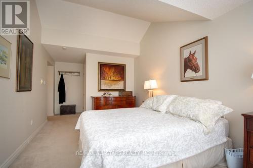 408 - 50 Rivermill Boulevard, Kawartha Lakes (Lindsay), ON - Indoor Photo Showing Bedroom