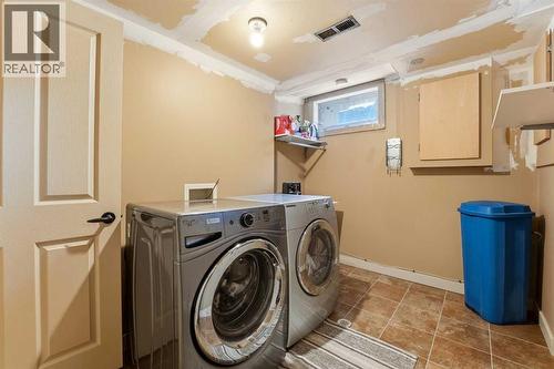 Shared Laundry - 14 Sherwood Crescent, Red Deer, AB - Indoor Photo Showing Laundry Room
