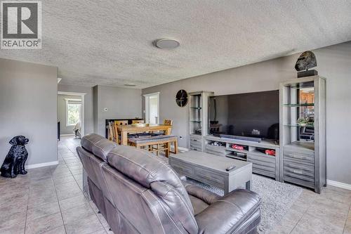 117 Cheecham Court, Anzac, AB - Indoor Photo Showing Living Room