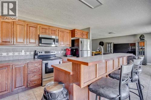 117 Cheecham Court, Anzac, AB - Indoor Photo Showing Kitchen