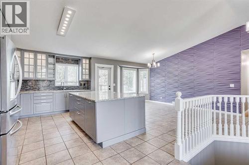 117 Cheecham Court, Anzac, AB - Indoor Photo Showing Kitchen