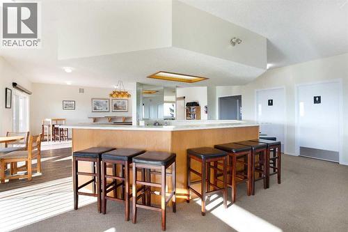 Amenities Building - Upstairs - 8, 118 Strathcona Road Sw, Calgary, AB - Indoor Photo Showing Dining Room