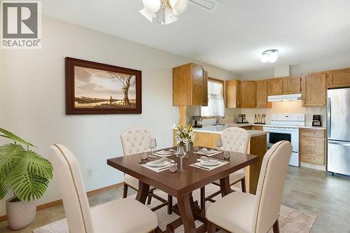 Virtually Staged - 8, 118 Strathcona Road Sw, Calgary, AB - Indoor