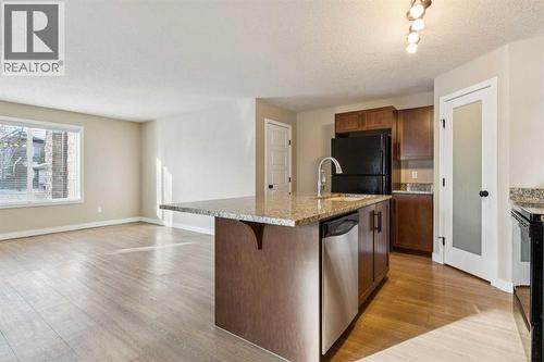 4102, 2781 Chinook Winds Drive Sw, Airdrie, AB - Indoor Photo Showing Kitchen