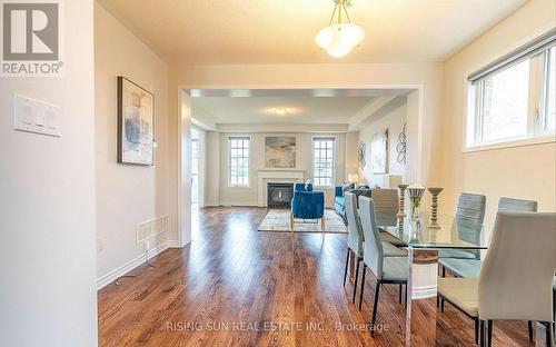 24 Herrick Drive, Brampton, ON - Indoor Photo Showing Dining Room With Fireplace