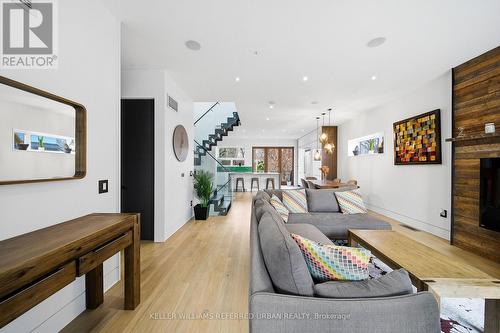 22 Daniels Street, Toronto, ON - Indoor Photo Showing Other Room With Fireplace