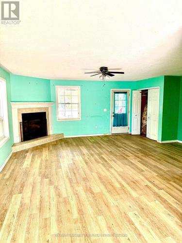 2 Oakwood Drive, Kawartha Lakes (Fenelon Falls), ON - Indoor Photo Showing Living Room With Fireplace