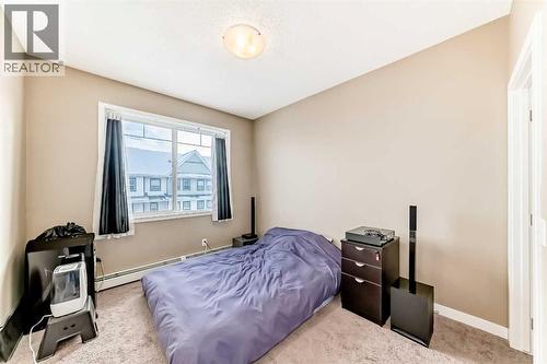 312, 48 Panatella Road Nw, Calgary, AB - Indoor Photo Showing Bedroom