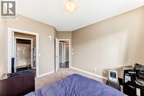 312, 48 Panatella Road Nw, Calgary, AB - Indoor Photo Showing Bedroom